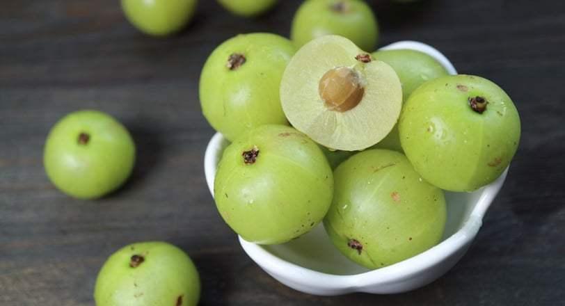 green amlas in a bowl