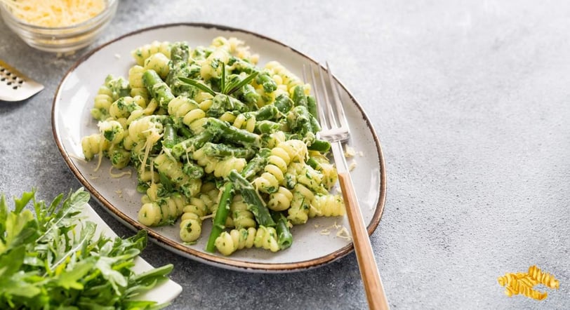 Creamy fusilli pasta dish with rich sauce, garnished for a delicious Italian meal
