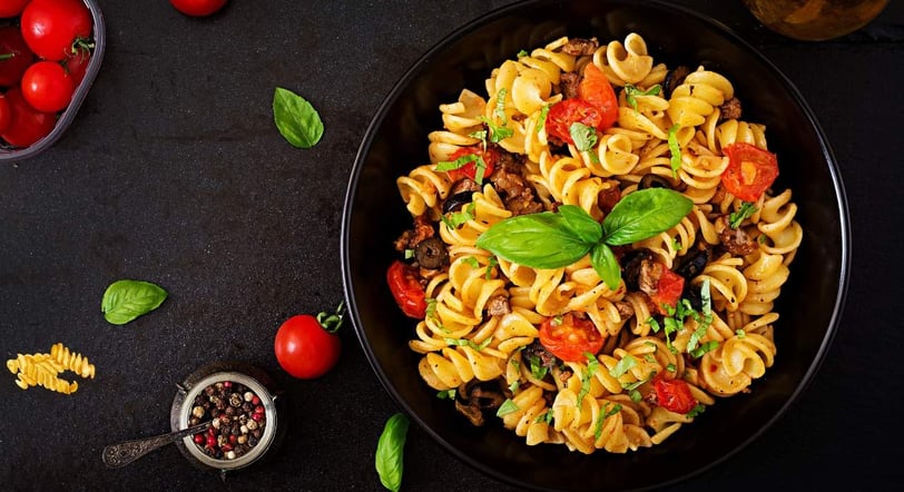 Close-up of fusilli pasta with corkscrew shape, ideal for holding sauces in Italian recipes