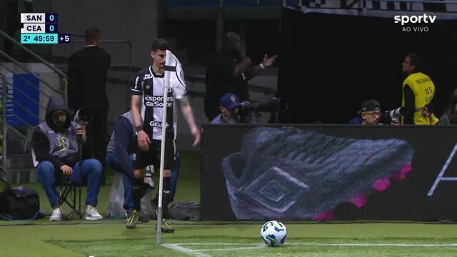 a soccer player is playing soccer on a field