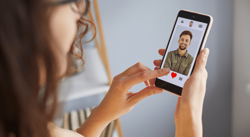 a woman is taking a selfie with her phone