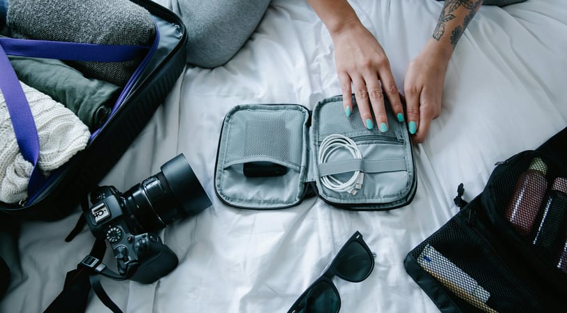 Smartly packed carry-on suitcase with travel essentials and packing cubes