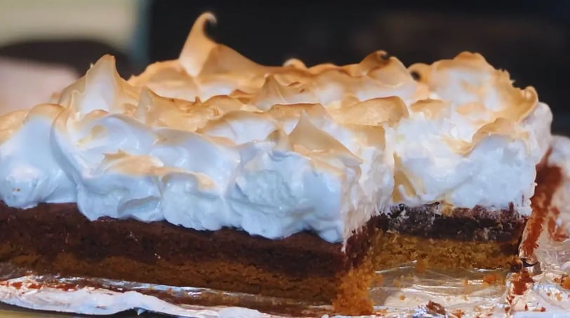 the ultimate smores bar dessert with smokey marshmallow meringue