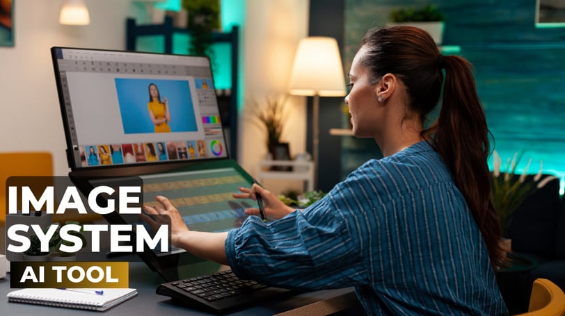 a woman sitting at a desk with a laptop computer designing images