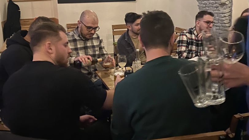 the participants at the table talking