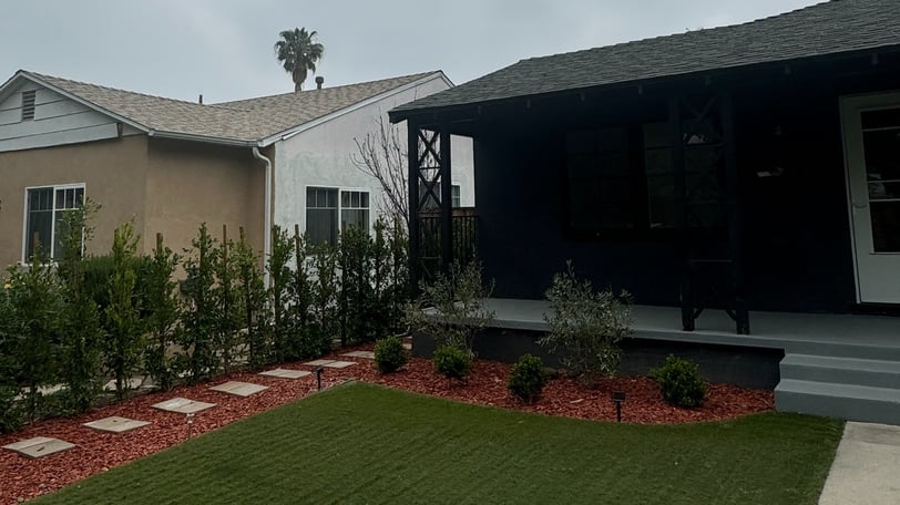 a house with a lawn and a lawn