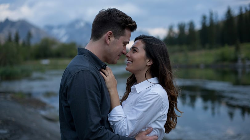 a man and woman standing next to each other