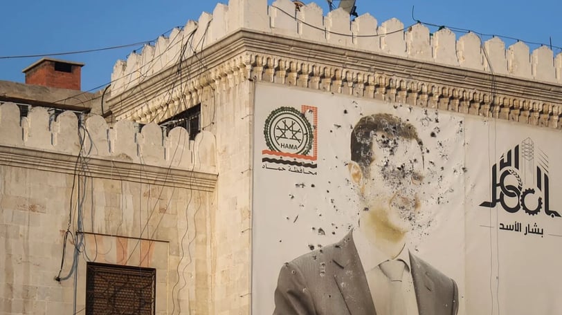The destroyed facade of Bashar Al Assad