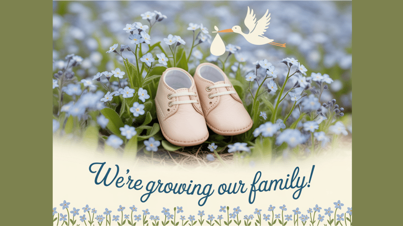 a pair of baby shoes with a stork