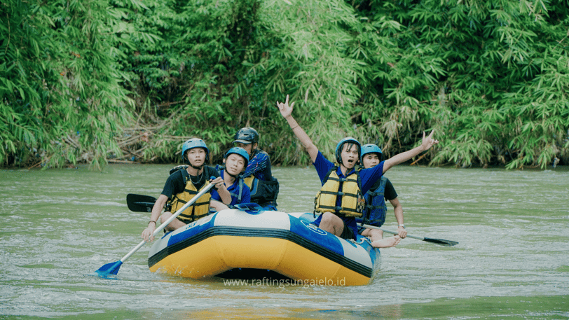a group of people on rafting down a river