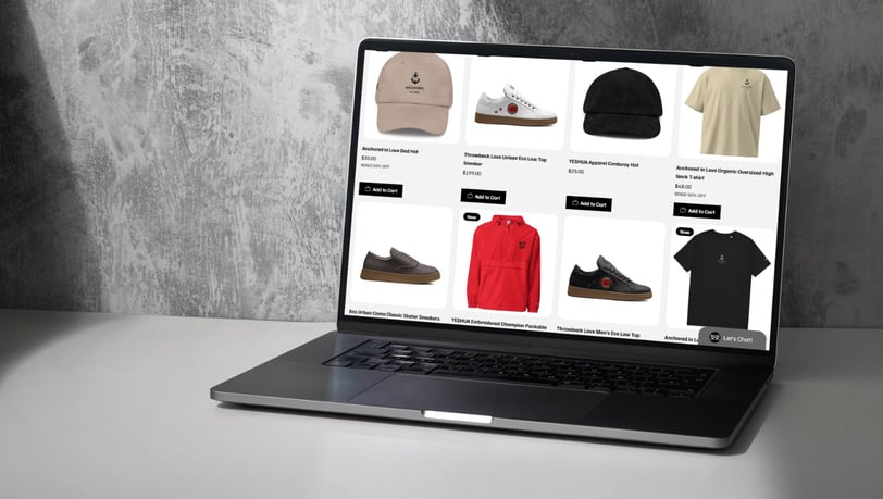 a laptop computer screen displaying YESHUA Apparel products