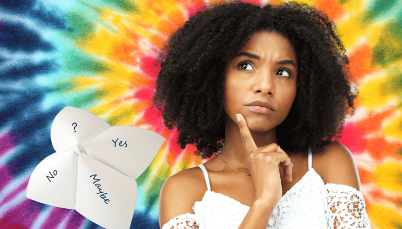 a woman with her finger on her chin in a thoughtful pose