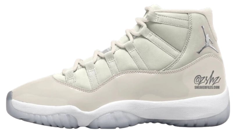 a pair of Nike Air Jordan 11 Sail (W)