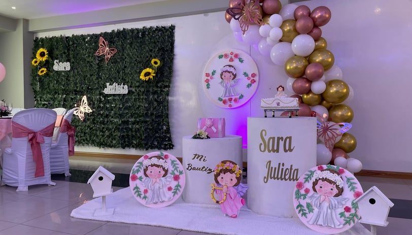 a table with a bunch of balloons and balloons