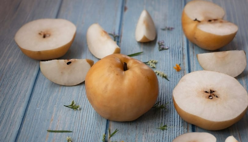 a bunch of korean pears on a table