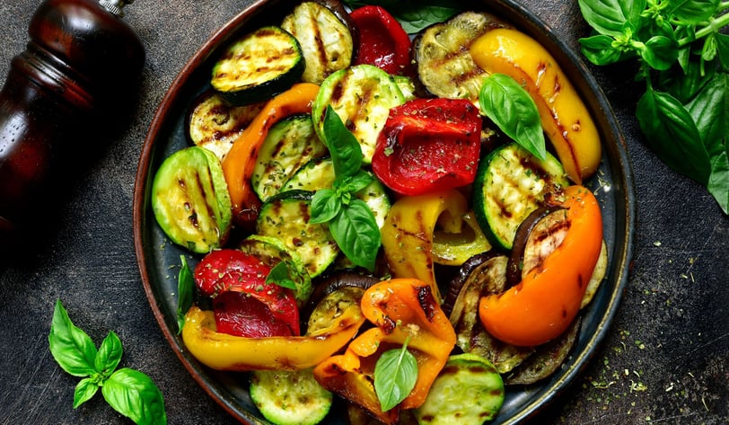 a vibrant array of cooked vegetables in a pan