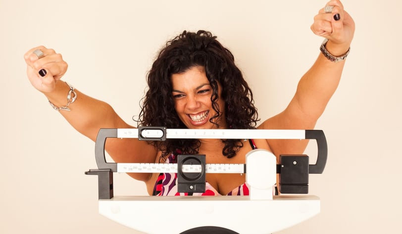 woman on weight scale