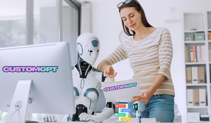a woman in a striped shirt showing a robot what to do on the computer