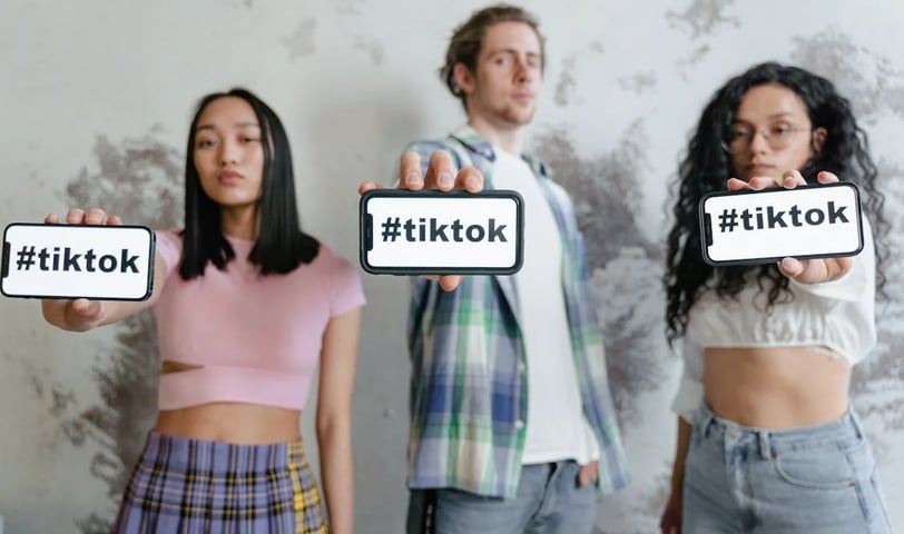 a group of people holding up signs that read hiit to the word hiit