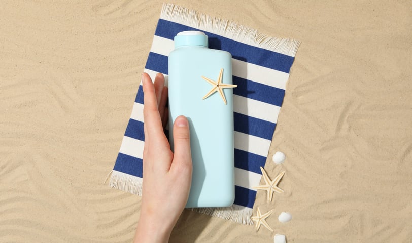 tanning lotion on the beach