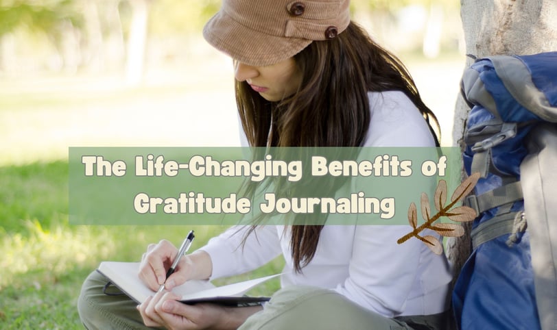 a woman sitting on the ground writing in her journal with a backpack and writing on it