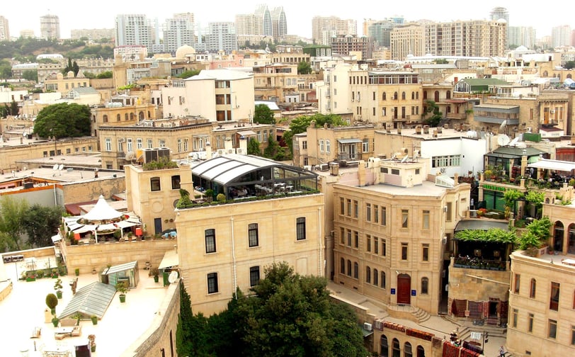 a cityscape of a city with a lot of buildings