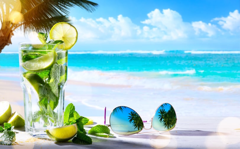 a tropical cocktail on a beach in punta cana