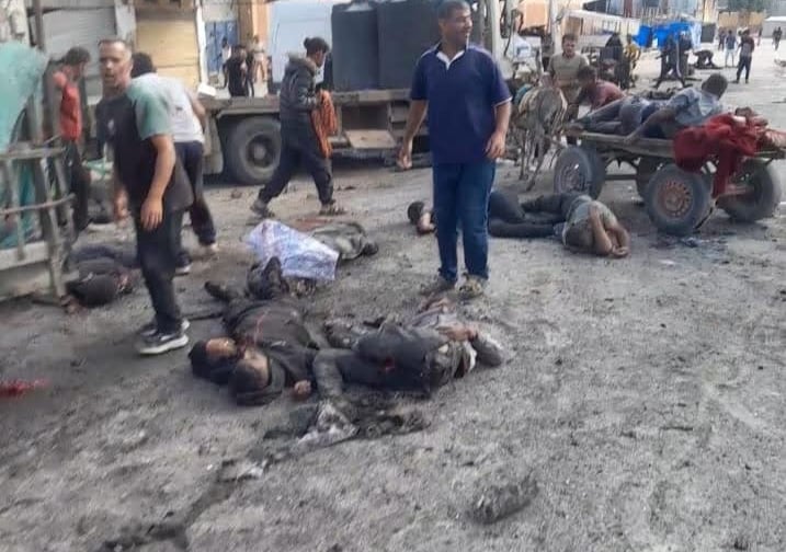 martyred Palestinian civilians in Khan Younis after Israeli forces opened fire near an aid distribu