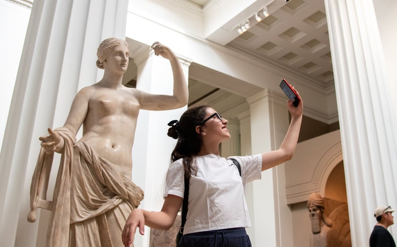 Visitor matching an artwork at the British Museum
