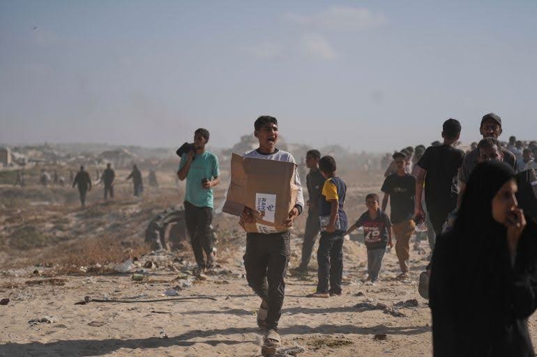 The fleeing of citizens in front of the Gaza humanitarian Foundation due to gunfire from the Israeli