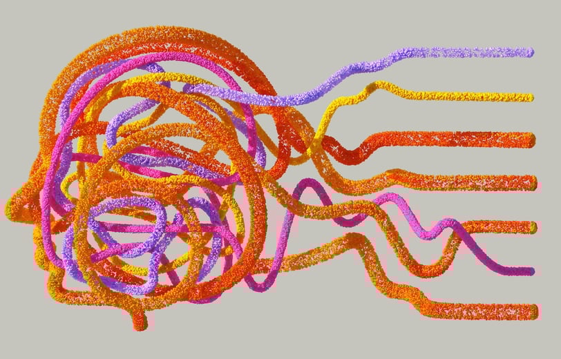 Colourful fibres making up the shape of a human head.