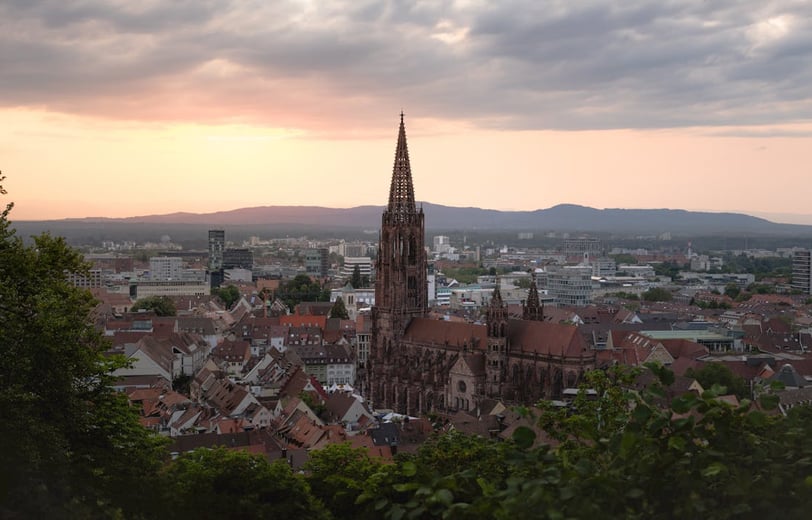 a church steeple with a steeple tower in the background