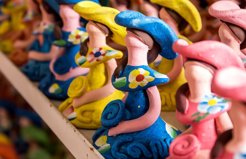 Muñecas Limé faceless dolls from the Dominican Republic, colorful handmade ceramic souvenirs