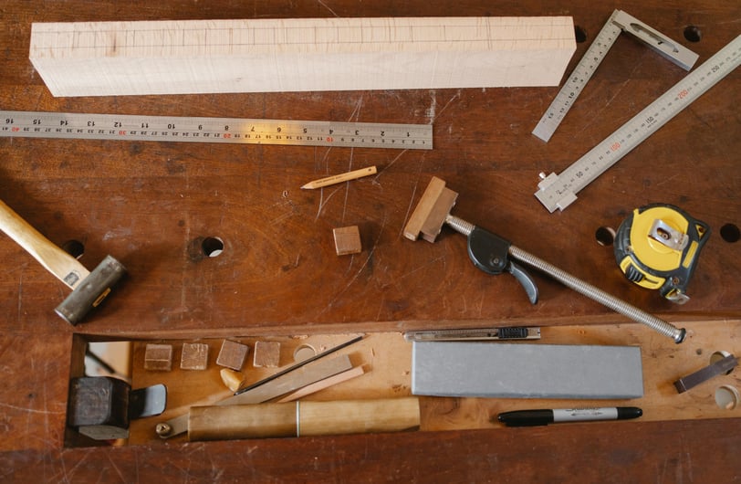 a table with woodworking tools