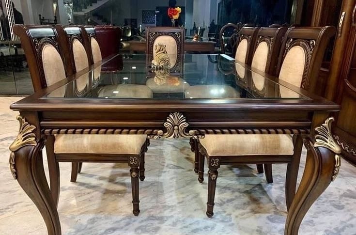 a dining room table with a glass top