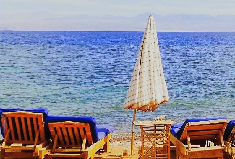 Relaxing in front of the sea on our chaise lounge