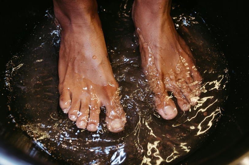 feet soaking in the water