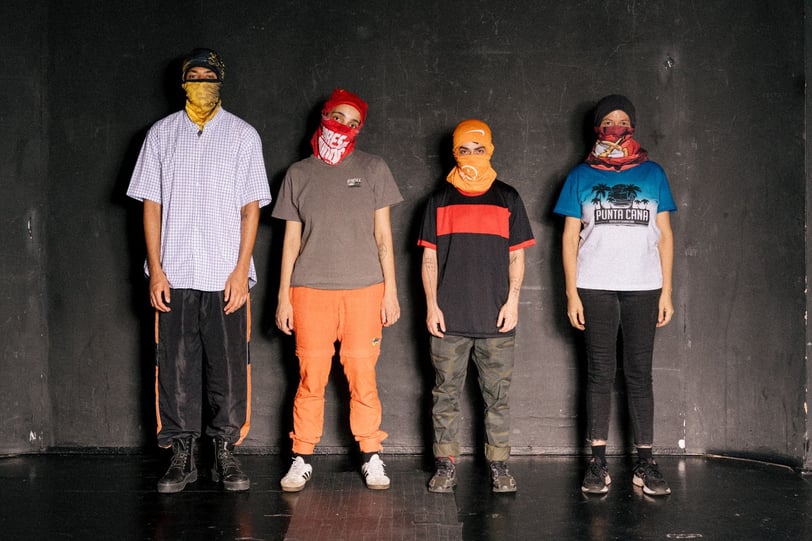 a group of people wearing masks and masks