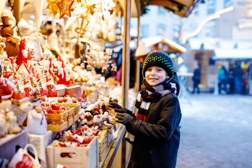 Winter, Best Time to Visit Bergen, Bergen Christmas market with wooden stalls and festive lights