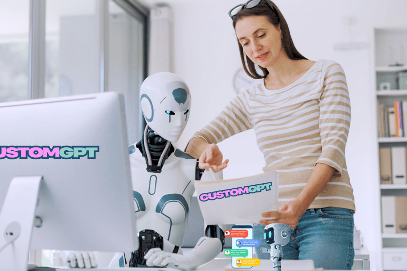 a woman in a striped shirt showing a robot what to do on the computer