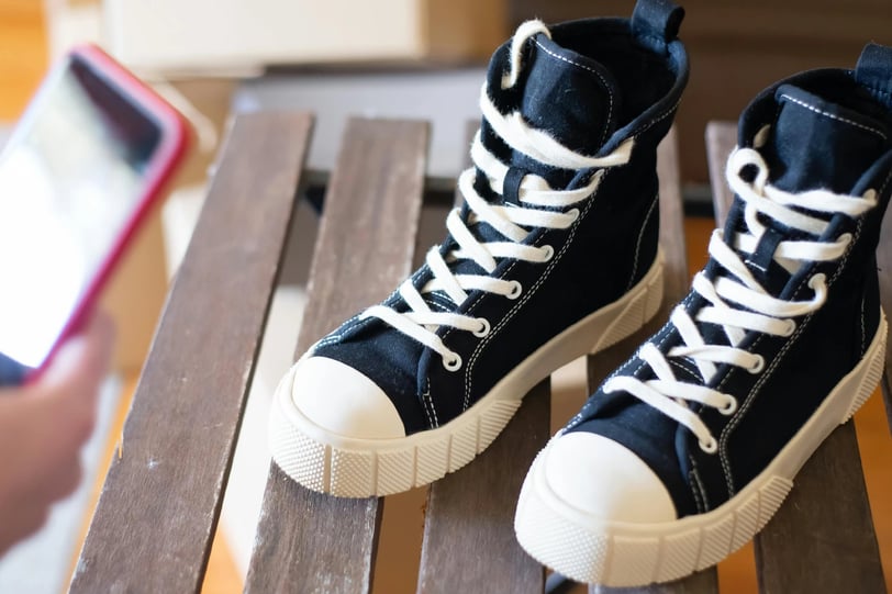 a pair Converse All Star sneaker