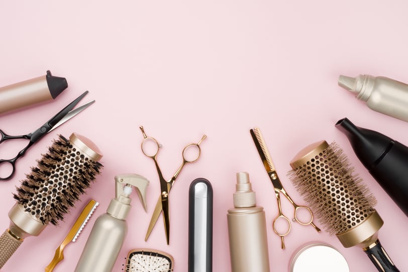 a variety of hairbrushes and hair styling tools