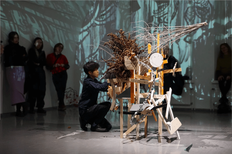 Audience viewing 'Assemble' ikebana performance-installation by Hedy Leung at HIAP Gallery