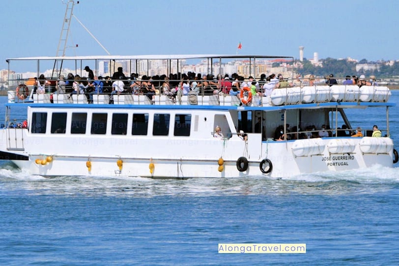 a ferry by José Guerrero Portugal Co with people on-board on the way to the beach in Olhao, Algarve