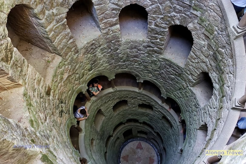 Greenish masonry round staircase of Quinta da Regaleira, that was built on King Dinis I land 