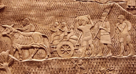 a large stone relief of a roman era relief of a chariot
