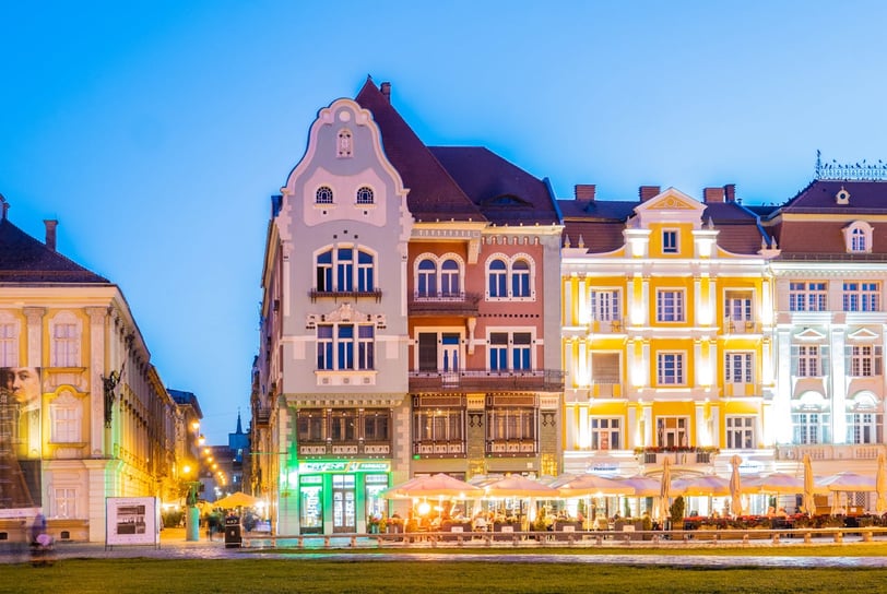 Colorful Buildings Under Blue Sky in Timisoara