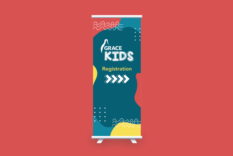 Grace Kids roll-up banner featuring a playful design with abstract shapes and bright colours.
