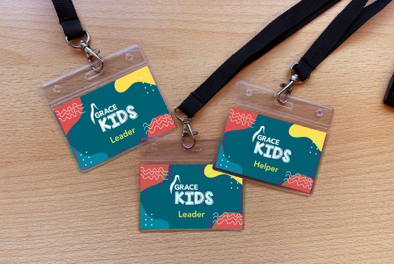 GraceKids lanyard badges for leaders and helpers, featuring a colourful, abstract design.
