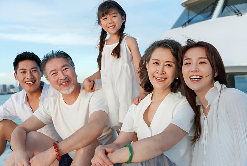 a family of four people posing for a picture